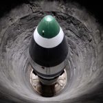 Missile in concrete silo, top view, preparing to launch. Underground base